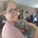 Happy client with her new pup